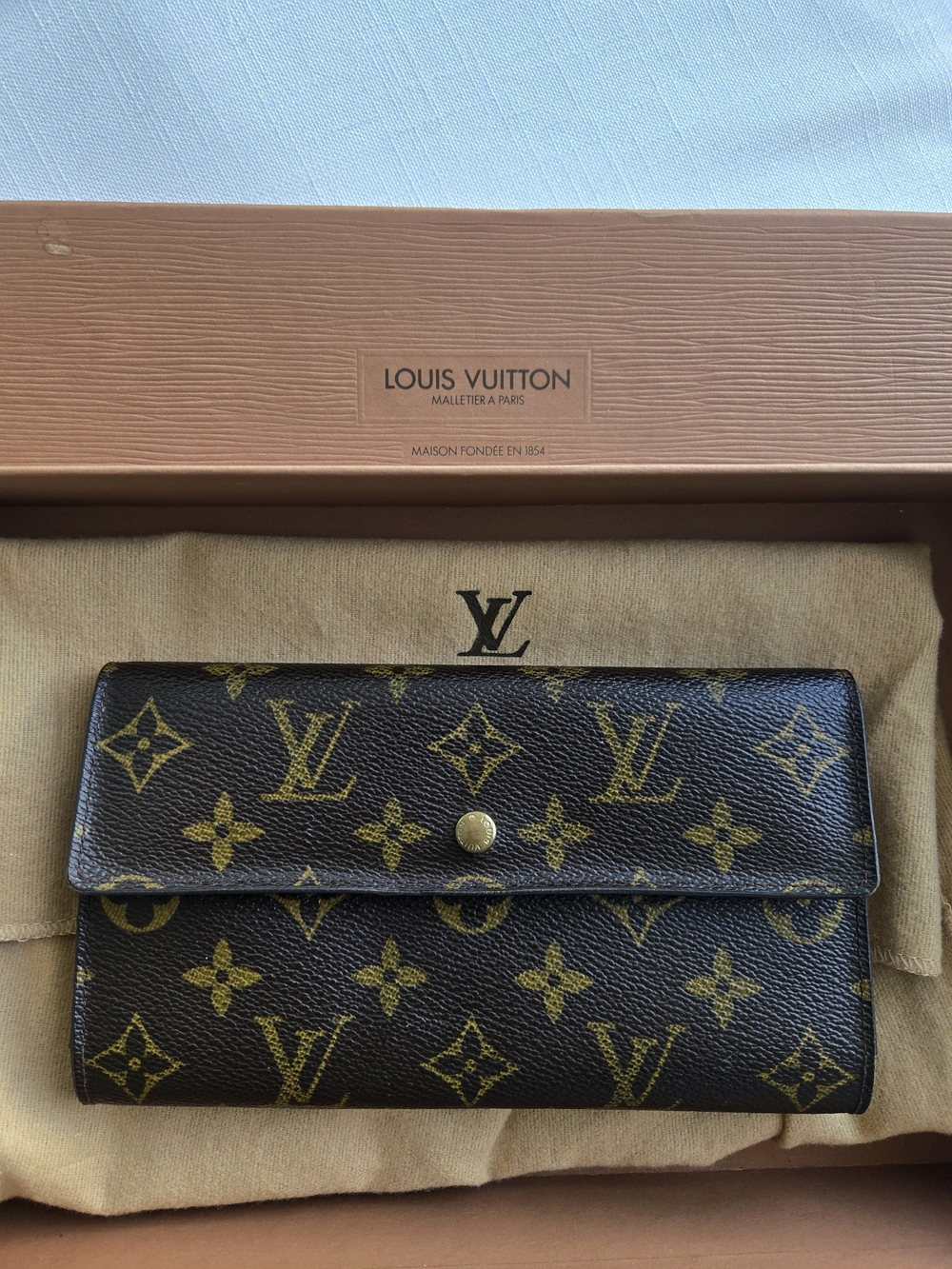 Authentic Louis Vuitton Monogram Canvas Continental Wallet in Brown